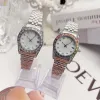 2024 Top Women White Diamond Diamond Lristwatches تواجه تاريخ كبير في الكوارتز أوتوماتيكية ساعة مضادة للماء الساعات النسائية الفولاذ المقاوم للصدأ