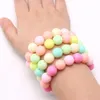 Meninas elásticas coloridas para adolescentes e crianças pulseiras com contas de pérola