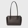 O saco de linhas é feito de couro genuíno com um design minimalista e versátil, possui uma bolsa de grande capacidade, uma bolsa de ombro, uma bolsa de axila e uma bolsa de alta qualit