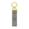 Llavero Llavero de diseño Llavero de lujo Letra de aleación de zinc Cordón unisex Oro Negro Metal Pequeña joyería