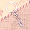 Keychains 20st Fashion Keychain 21x8mm Flip Flops Slipper Pendants Diy Men smycken bil Key Chain Ring Holder Souvenir för gåva