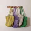 Bolsas de ombro Bolsa de tecido de fio de algodão Bolsa de tecido de malha de grande capacidade de ombro único Bolsa feminina pequena feita à mão Lazer férias praia bagcatlin_fashion_bags