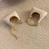 Boucles d'oreilles à clous coréens, sac à glaçure blanche, petite mode pour femmes, métal élégant, 2024