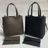 Row Minimalistyczna skóra dojazdu do pracy na dużą pojemność pojedyncza crossbody Tote Mother and Child Bag Pionowa kwadratowa torba kubełkowa Wysoka jakość