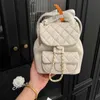 Springs Designer Fashion Backpack Duma Bookbag Mini sac sac à main Luxury Femmes Épaule Cross Body Card Solder en cuir matelassé sacs à main