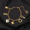 Braccialetti con ciondoli di design Set di gioielli con collana con bracciale multi-ciondolo con lettera in acciaio al titanio placcato che non sbiadisce per gioielli di fascia alta alla moda da donna