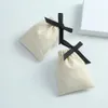 Jewelry 50pcs Jute Cotton Drawstring Bags with Black Ribbon Jewelry Packaging Wedding Favor Bags Nature Cotton Canvas Gift Pouch Gift