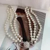 Naszyjniki wisiorek wielowarstwowy naszyjnik perłowy dla kobiet Choker Baroque Clavicle Łańcuchy