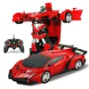 Auto elettrica/Rc telecomando deformazione auto ricarica induzione trasformazione King Kong Robot elettrico bambini consegna goccia giocattoli Dhxmh
