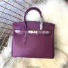 Designer Bags Luxury Fashion Totes Autumn and Winter Fashion Top Layer Cowhide Bag Lychee Grain äkta läder Womens väska Full läder stor väska en axel handba