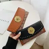 Lock de alta calidad Mujeres Diseñador de billeteras Lady Fashion Casual Card carteras Femeninas Femeninas de estilo largo No104183L