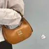 New Miao Family Fashionable and Luxury Handheld Underarm Sac Single épaule oblique Cross Crescent Sac