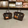 Designer-Taschen Luxus Mode Totes Togo Leder Ebony Bag mit orange Handtasche in modischen Top-Layer Cowide Pendler Cross-Body Womens Trend