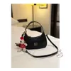 New Miao Family Fashionable and Luxury Handheld Underarm Sac Single épaule oblique Cross Crescent Sac