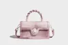 Kvällspåsar trend nisch design glass färg twist handväska handväska high-end mode enkel axelväska mångsidig korskropp
