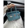 Designer Bags Luxury Fashion Totes New Long Handbag Silver Button Head Layer Cowhide Fashion One Shoulder Handbag Lock Buckle Leather Women's Bag Handbag