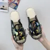 Pantoufles 2024 printemps et été paillettes Baofeng demi-femmes mode paille bratté plat pêcheur chaussures filet fil Muller