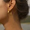 Orecchini a cerchio in acciaio inossidabile placcato oro 18 carati, design in stile architettonico a prova di ossidazione, doppia bobina per le donne, gioielli minimalisti per l'orecchio