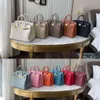 Borse firmate Totes moda di lusso Borsa avvolgente in pelle a grana litchi Borsa versatile da donna di grande capacità in pelle bovina primo strato Borsa a tracolla monospalla in pura pelle