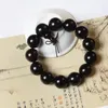 Filo selezionato Bracciale ad anello in legno di sandalo nero antico Bracciale con perline di Buddha viola Copricapo Gioielli Perline di preghiera