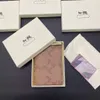 Diseñador de lujo Pasaporte de cuero Fundas para monedero Titular de la tarjeta de crédito Coah Mini Monedero Monedero Orden de mezcla disponible con logotipo Caja Embalaje Hombre Mujer 10.3x14.2 CM