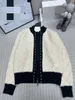 10002 2024滑走路春夏同じスタイルのセーター赤い白い長袖クルー首の女性服高品質の女性Qian