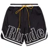 Designer shorts rhude masculino cápsula verão praia calças material de malha respirável suor solto fitness basquete masculino curto preto 666