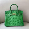 Sacs de créateurs Fourre-tout de mode de luxe 2023 Nouveau modèle de crocodile Sac en cuir véritable Sac pour femme Original en cuir de vachette Boucle de verrouillage Sac à main de mode Sac de mariée