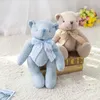 Outras artes e artesanato Urso de pelúcia fofo brinquedo de pelúcia de malha de lã conjunta arco urso boneca macia bebê calmante sono presente de casamento de aniversário infantil para crianças yq240111