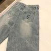 Pantalones de mezclilla con letras clásicas para mujer Letras bordadas Jeans de diseñador Pantalones de pierna ancha de cintura alta Estilo callejero Hiphop Ropa de pantalón largo