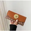 Lock de alta calidad Mujeres Diseñador de billeteras Lady Fashion Casual Card carteras Femeninas Femeninas de estilo largo No104183L