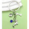 Porte-clés 1pc mode mignon chien série animal de compagnie porte-clés sac d'argent créatif sac à dos accessoires de charme pour les amateurs d'amis pendentifs cadeaux