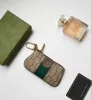 Porte-monnaie chaud AAA haute qualité en cuir porte-clés femmes pièces de monnaie sacs à main hommes sacs à monnaie femmes concepteur pochette clé porte-carte sac à fermeture éclair Wa