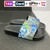 Nya bilder designer kvinnor sandaler män gummi glid tofflor med låda platt tofflor blommig mode sommar utomhus skon kvinnliga skjutreglage man dusch inomhus strand sandal