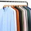 Camisas elásticas antiarrugas de alta calidad para hombre, vestido de manga larga para hombre, blusa ajustada de negocios Social, camisa de Color sólido 240111