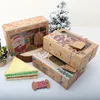 Present Wrap 100st/Lot Christmas Candy Cookie Kraft Paper Box med plast PVC -fönster pepparkakor chokladkartong