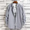 Camicie eleganti da uomo 2024 Estate Alla moda Vestibilità ampia Risvolto casuale Patchwork a righe Bottoni Camicia a maniche lunghe oversize minimalista