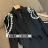 Giacca irregolare con catena di diamanti OL Colletto rovesciato Cappotto con strass Blazer Top in cristallo Perline Pacchetto Gonna Abito da donna 2 pezzi Set 240110