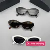 Designer-zonnebril Nieuwe P Family-zonnebril Vrouwelijke internetberoemdheid Dezelfde gepersonaliseerde zonnebril met onregelmatige plaat SPR26z N6RD