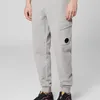 Pantaloni da uomo con logo Abbigliamento sportivo da esterno staccabile per il calore Pantaloni sportivi con tasche con cerniera in cotone casual