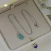 Collane con ciondolo Set di gocce d'acqua in Zricon pieno di pietra blu chiaro di colore argento di alta qualità per gioielli di lusso da donna DN050