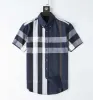 Projektanci Sukienka Męki Koszule Business Fashion Casual Classic Long Shirt Shirt Men Men Haftery Chemises de Marque Stylist Stylist Luksusowe ubrania 7665