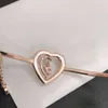 Pulsera Swarovskis Diseñador Mujer Brazalete de calidad superior Noche estrellada Charla de miel Pulsera en forma de corazón Elemento femenino Pulsera de corazón de cristal Mujer