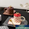 Piatto a scacchiera in ceramica con coperchio, cucchiaio, tazza con manico rotondo grande, tazza da caffè per ufficio, tazza per bere a casa