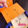 Pendant Necklaces Luxury Brand Heart Pendant Necklaces Gold Plated Simple Love Copper Ring Printed designer necklace Women Designer Jewelry ULRG