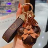 Fashion Bunny Design Key Chains Ring Pompom Ball Rabbit Bag Pendant Charm Keyring Buckle Gift Jewelry Accessories Pu Leather Brown Flower