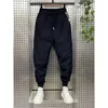 Pantalon cargo épais en coton pour hommes, tendance, grande poche, portant un pantalon en coton, pantalon thermique, hiver 240112