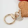 Keychains Full Rhinestone Heart Key Chains Light Luxury Alloy Rings for Girls Liten Fresh Ring Handbag Pendant Creative
