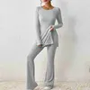 Inicio Ropa Camiseta con dobladillo dividido para mujer Conjunto de pantalones con pierna acampanada Camisetas simples Traje de pantalón con cintura elástica superior Pantalones ajustados de color sólido Trajes holgados para el hogarvaiduryd