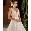 Kwiatowe sukienki ślubne Backless Znakomite A-Line V Szyjka Ślubna Aplikacja Tiulowe Suknie dla kobiet